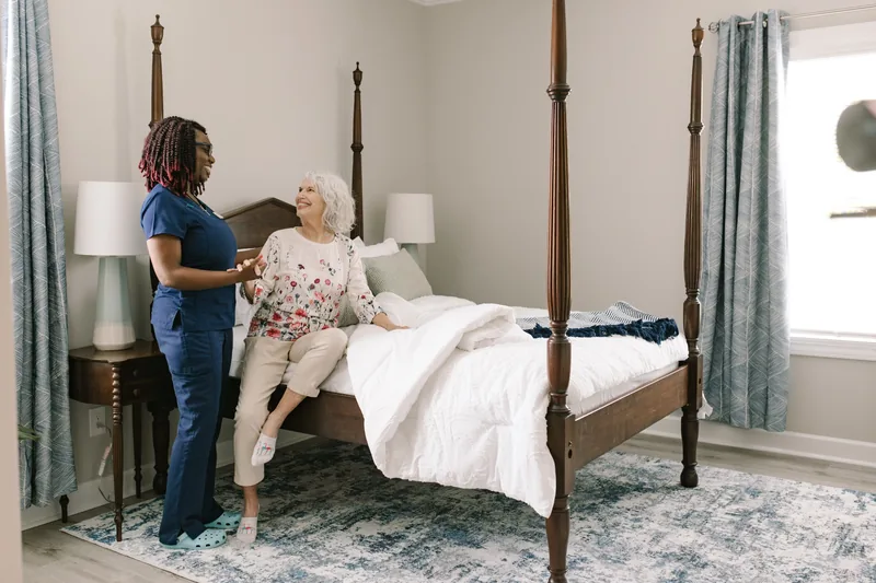 DayBreak caregiver helping an older adult prepare a meal at home